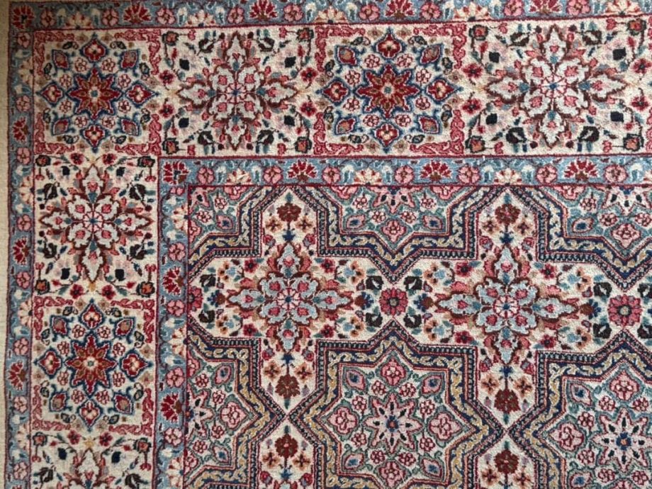 Alfombra con motivo floral y estrellas