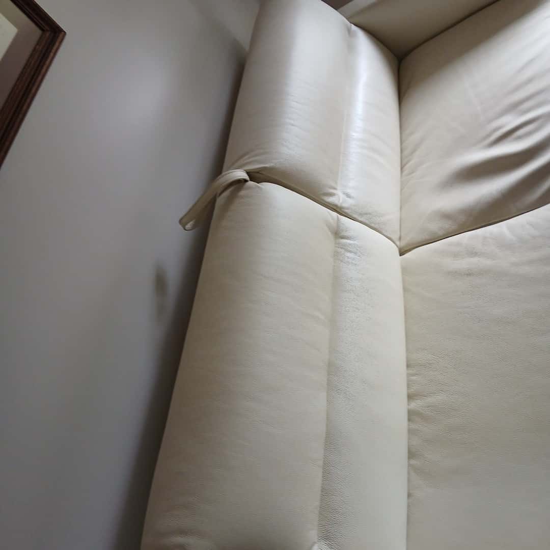 Sillón cama con patas cromadas