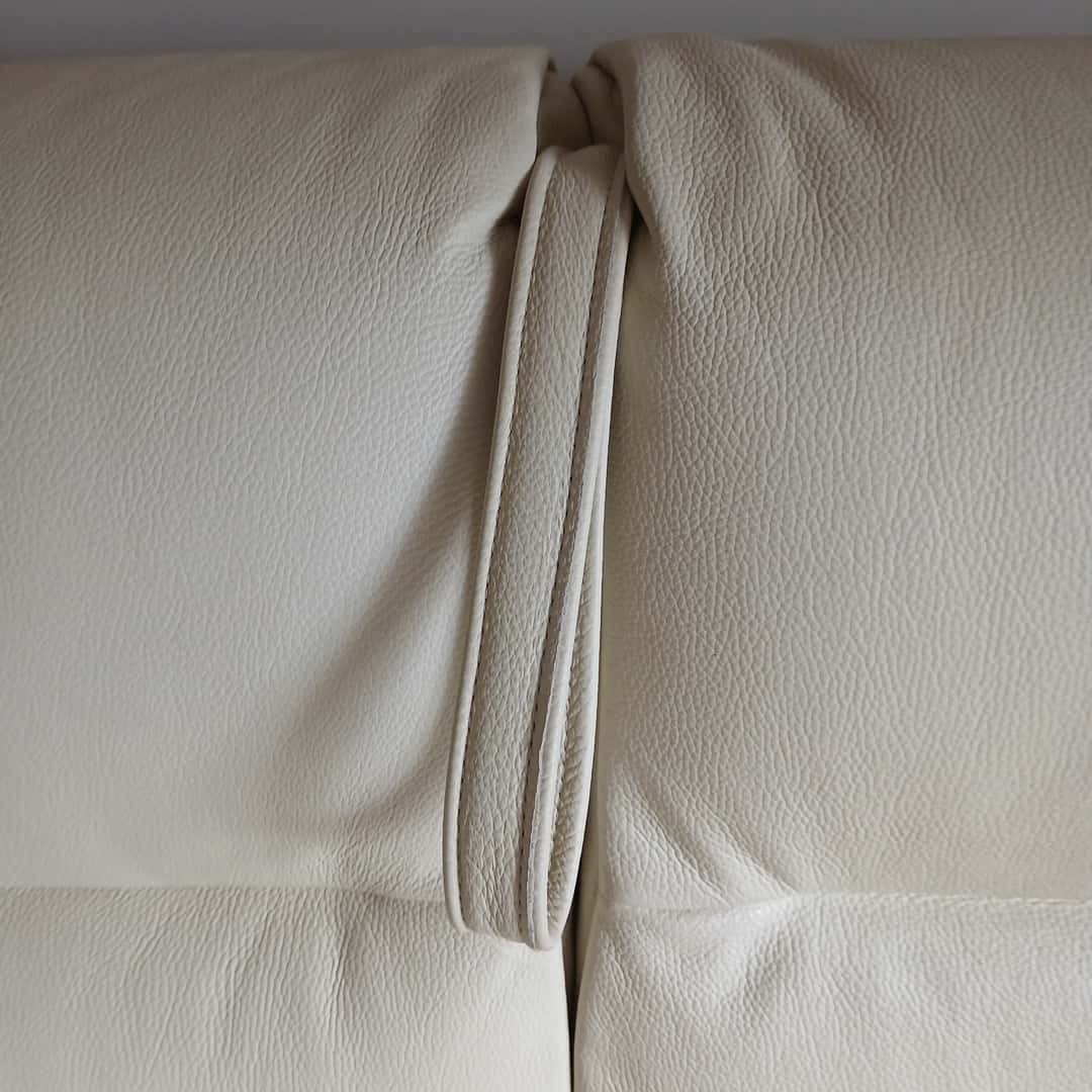 Sillón cama con patas cromadas