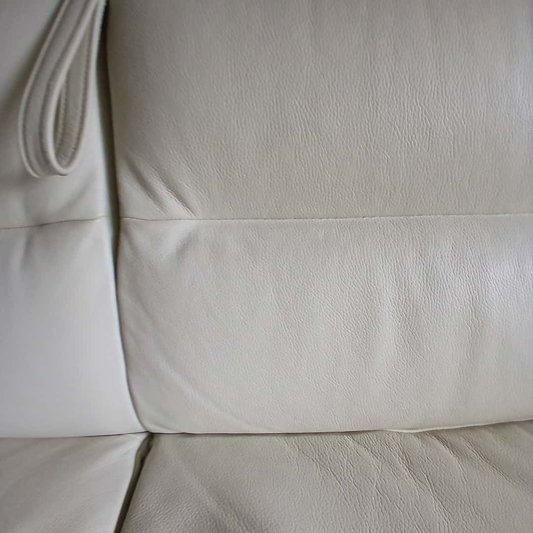 Sillón cama con patas cromadas